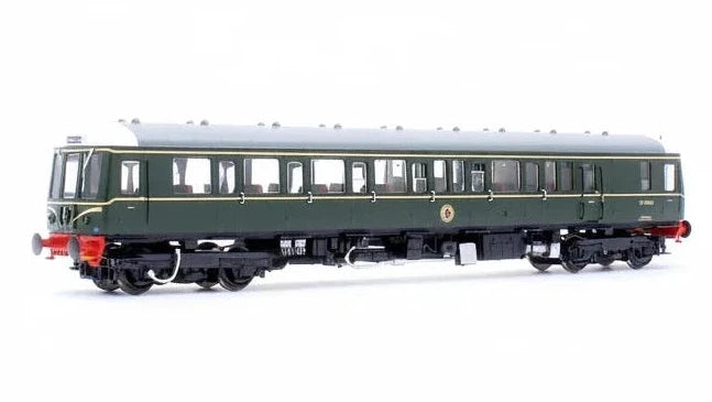 Model train car in green and red on a white background