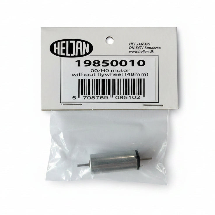 A small Heljan 00/H0 motor part, number 19850010, shown in its original retail packaging. The product is a silver metal motor inside a clear plastic bag with a white cardboard header card featuring the Heljan logo and barcode.