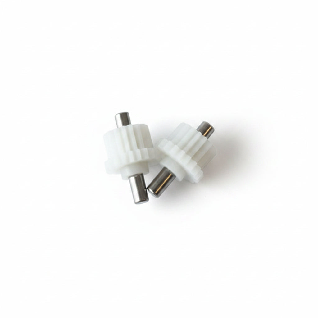 A small packaged mechanical parts set labeled 'Heitan Complete gear assembly for O gauge' in a clear plastic bag with a white paper header card, photographed against a plain light background.